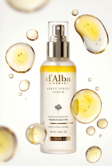 d'Alba Piedmont First Spray Serum 100ml bottle with floating golden oil droplets for radiant skin